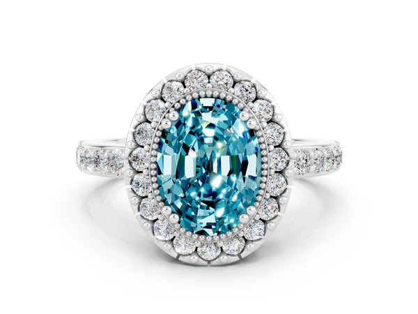White gold Oval Cut Blue Topaz Halo Ring with Pavé Band and Prong Setting