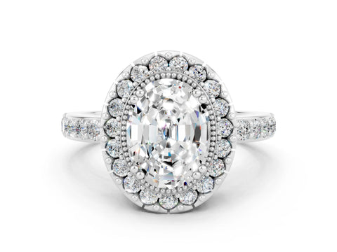 White gold Oval Cut Diamond Halo Ring with Pavé Band and Prong Setting