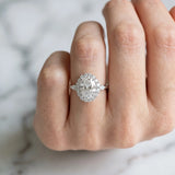 White gold Oval Cut Diamond Halo Ring with Pear Side Stones and Prong Setting_130