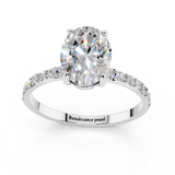 14K White Gold 1.10 Carat E VS1 Oval Cut Diamond Pavé Band Solitaire Ring with Four-Prong Setting