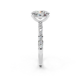 14K White Gold 1.10 Carat E VS1 Oval Cut Diamond Pavé Band Solitaire Ring with Four-Prong Setting
