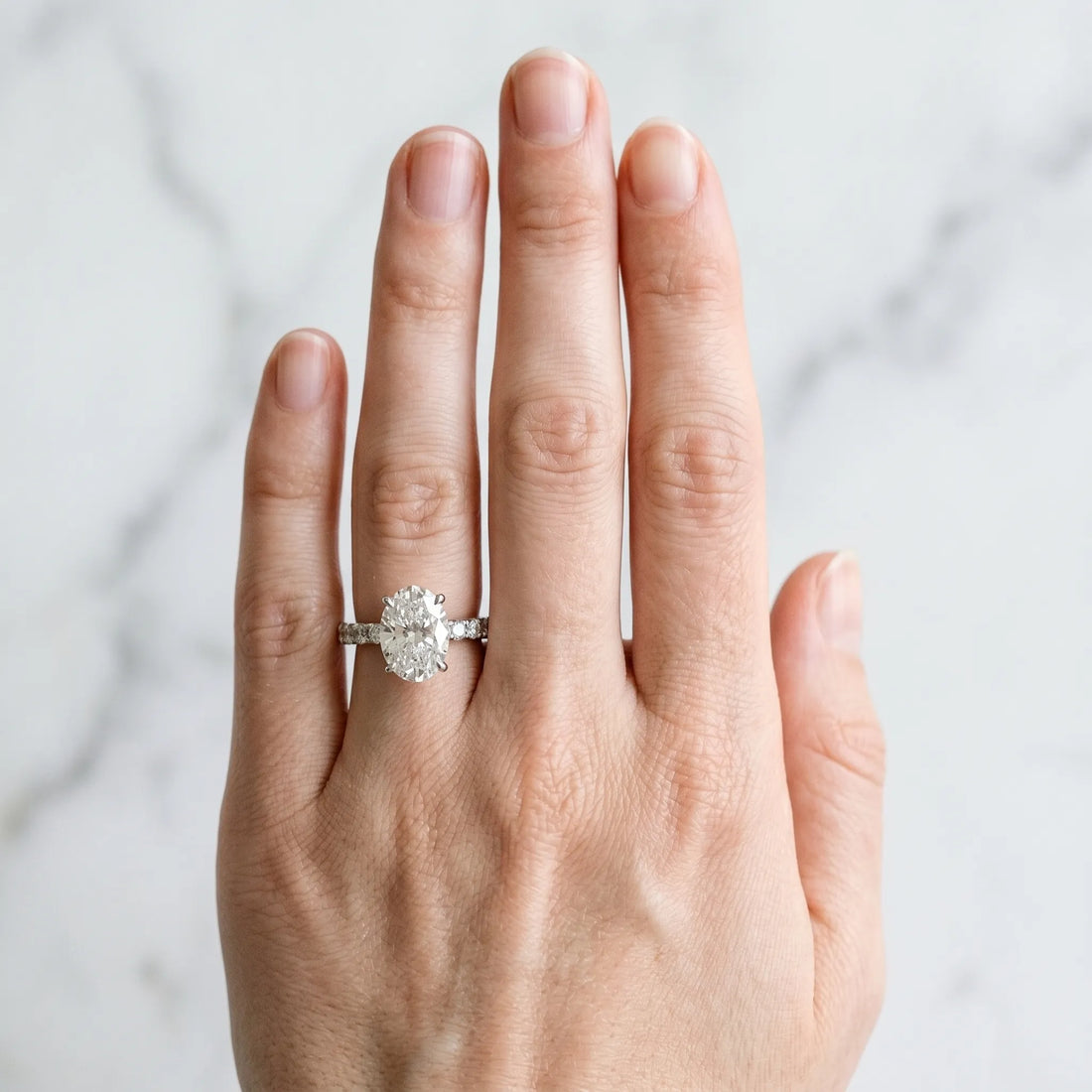 White gold Oval Cut Diamond Pavé Band with Four-Prong Setting_60