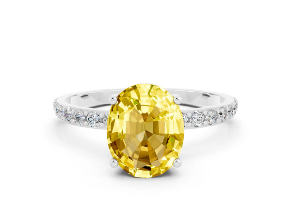 Platinum Oval Cut Yellow Sapphire Solitaire Ring with Round Pavé Shoulders and Prong Setting