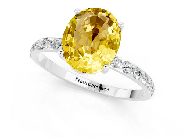 White gold Oval Cut Yellow Sapphire Solitaire Ring with Round Pavé Shoulders and Prong Setting
