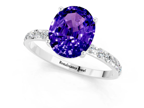 Platinum Oval Cut Tanzanite Solitaire Ring with Round Pavé Shoulders and Prong Setting