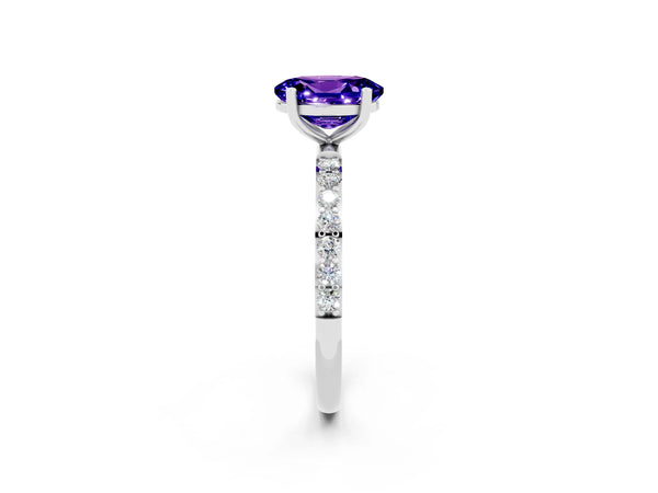 White gold Oval Cut Tanzanite Solitaire Ring with Round Pavé Shoulders and Prong Setting