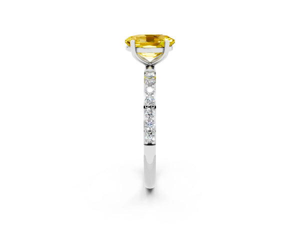 Platinum Oval Cut Yellow Sapphire Solitaire Ring with Round Pavé Shoulders and Prong Setting