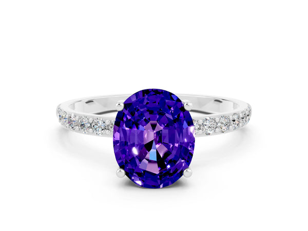 White gold Oval Cut Tanzanite Solitaire Ring with Round Pavé Shoulders and Prong Setting