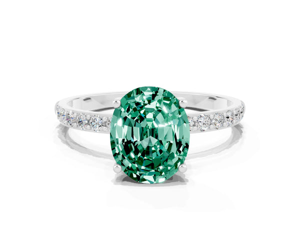 Silver Oval Cut Green Sapphire Solitaire Ring with Round Pavé Shoulders and Prong Setting