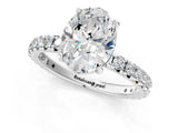 White gold Oval Cut Diamond Pavé Solitaire Ring with Round Band and Prong Setting_25