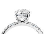 White gold Oval Cut Diamond Pavé Solitaire Ring with Round Band and Prong Setting_52