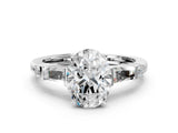 White gold Oval Cut Diamond Ring with Baguette Side Stones, Channel Set Band, and Four-Prong Setting_45