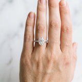 White gold Oval Cut Diamond Ring with Marquise Side Stones and Prong Setting_87
