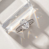 White gold Oval Cut Diamond Ring with Milgrain Pavé Band and Four-Prong Setting_15