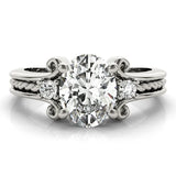 White gold Oval Cut Diamond Ring with Scrollwork Band and Prong Setting 1