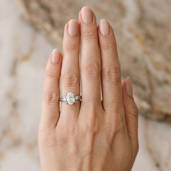 White gold Oval Cut Diamond Ring with Scrollwork Band and Prong Setting