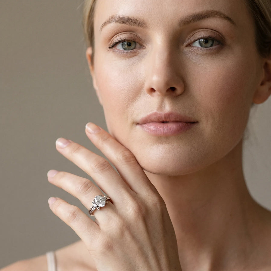 White gold Oval Cut Diamond Ring with Scrollwork Band and Prong Setting