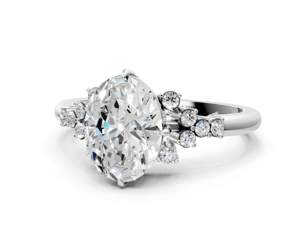 Platinum Oval Cut Diamond Ring with Side Stones and Four-Prong Setting