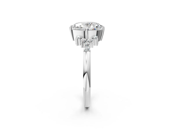 Platinum Oval Cut Diamond Ring with Side Stones and Four-Prong Setting