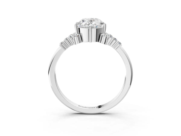 Platinum Oval Cut Diamond Ring with Side Stones and Four-Prong Setting