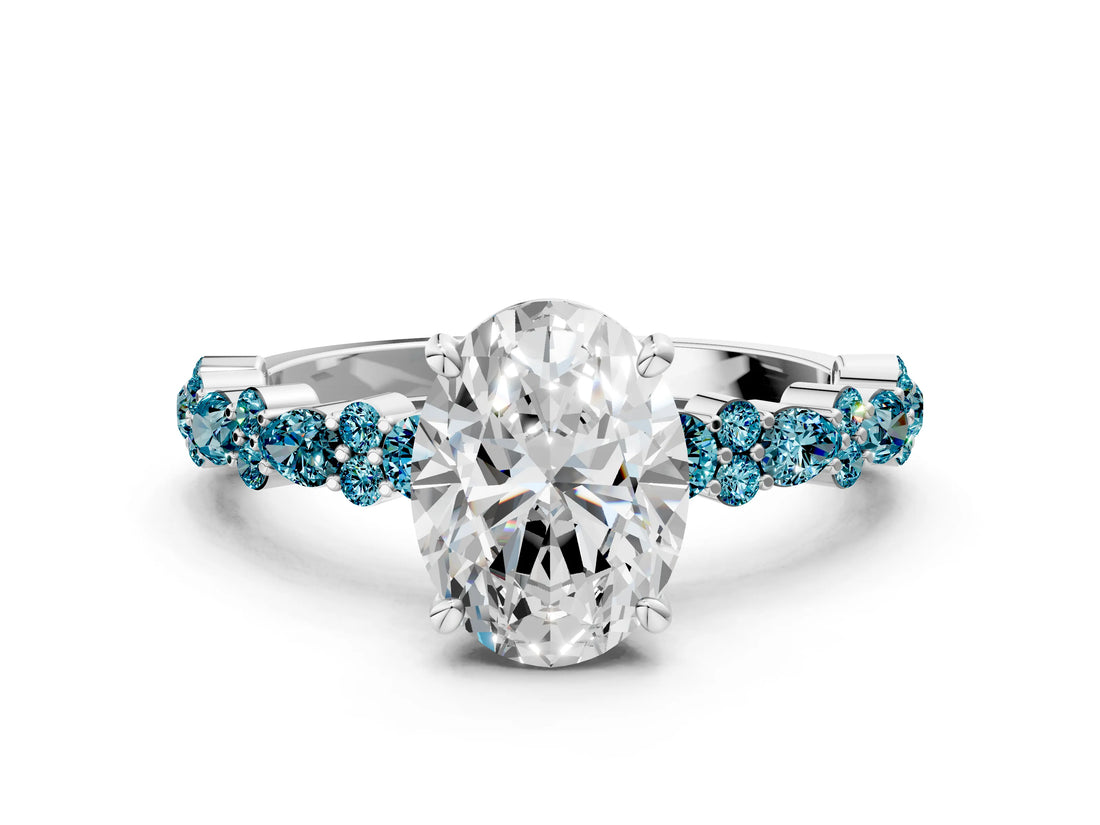 White gold Oval Cut Diamond Side Stone Solitaire Ring with Round with Blue Topaz side stone and Four-Prong Setting