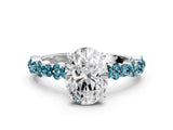 White gold Oval Cut Diamond Side Stone Solitaire Ring with Round with Blue Topaz side stone and Four-Prong Setting_12