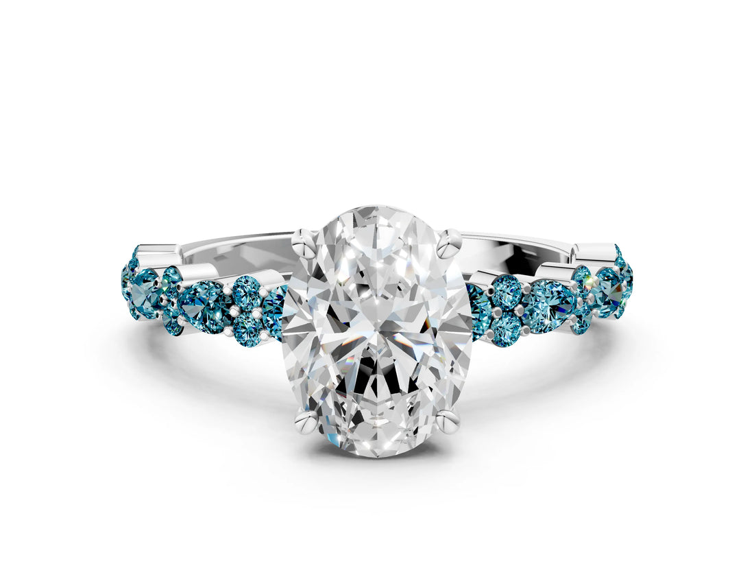 White gold Oval Cut Diamond Side Stone Solitaire Ring with Round with Blue Topaz side stone and Four-Prong Setting