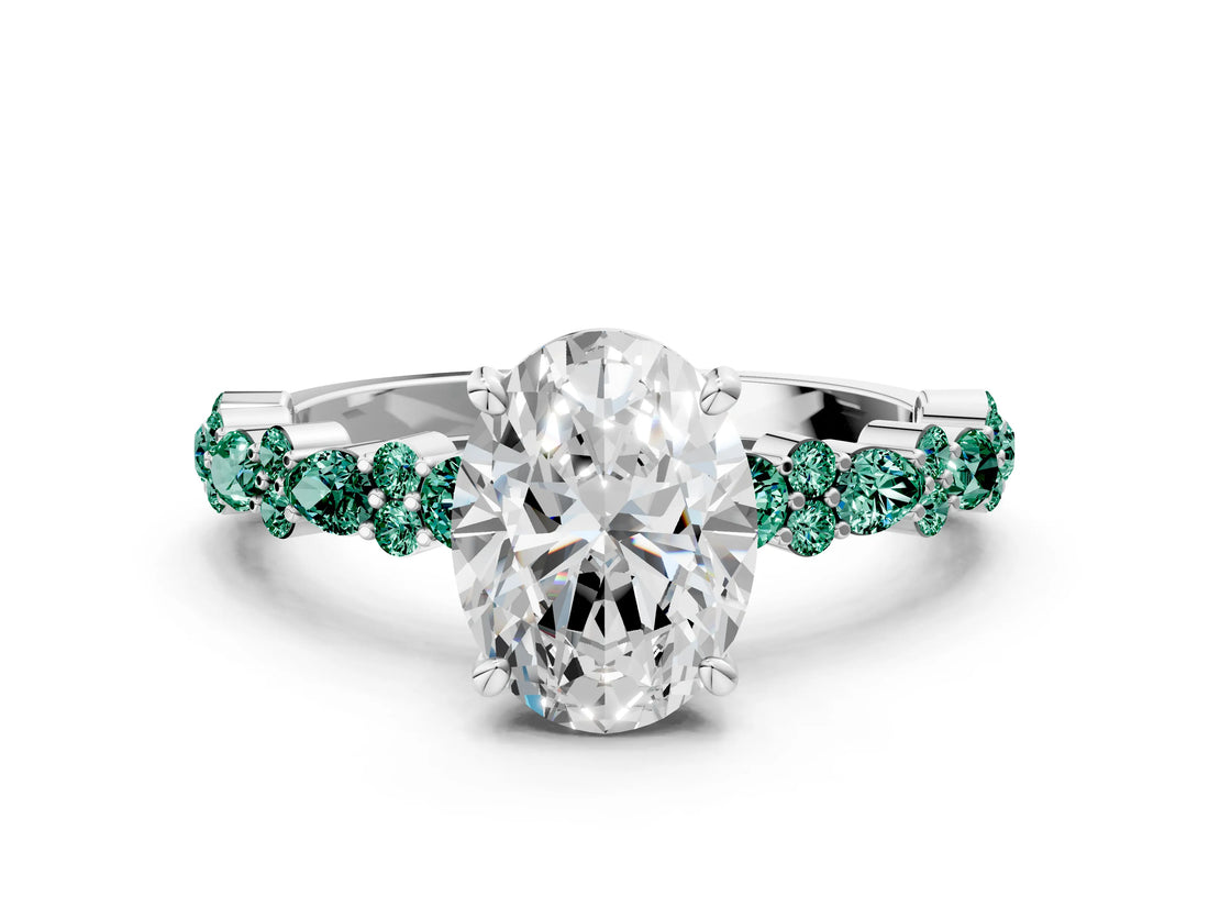 White gold Oval Cut Diamond Side Stone Solitaire Ring with Round with Green Sapphire side stone and Four-Prong Setting