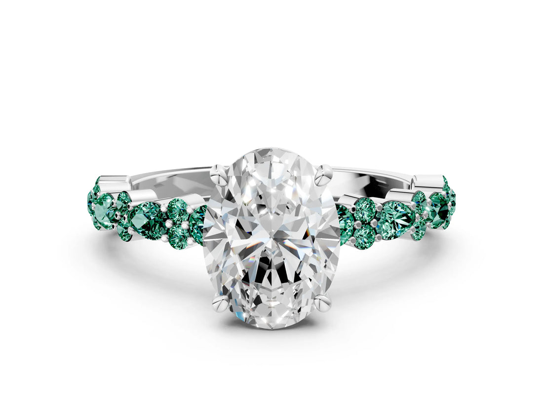 White gold Oval Cut Diamond Side Stone Solitaire Ring with Round with Green Sapphire side stone and Four-Prong Setting