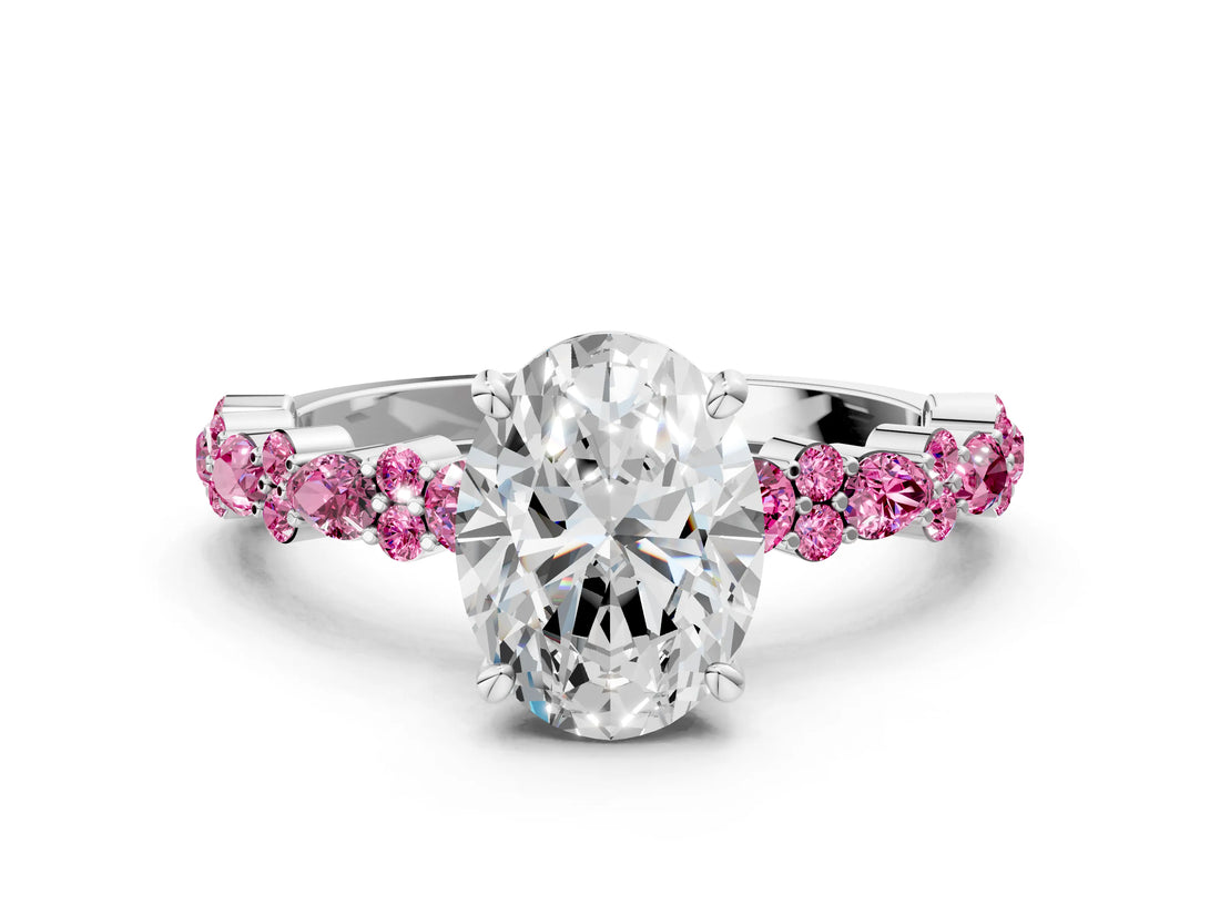 White gold Oval Cut Diamond Side Stone Solitaire Ring with Round with Pink Sapphire side stone and Four-Prong Setting