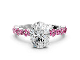 White gold Oval Cut Diamond Side Stone Solitaire Ring with Round with Pink Sapphire side stone and Four-Prong Setting