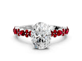 White gold Oval Cut Diamond Side Stone Solitaire Ring with Round with Ruby side stone and Four-Prong Setting