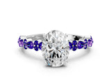 White gold Oval Cut Diamond Side Stone Solitaire Ring with Round with Tanzanite side stone and Four-Prong Setting