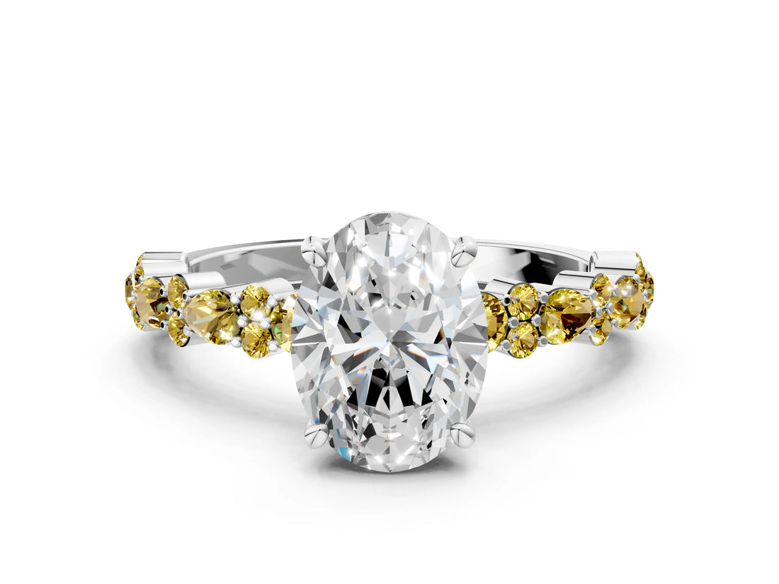 White gold Oval Cut Diamond Side Stone Solitaire Ring with Round with Yellow Sapphire side stone and Four-Prong Setting