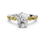 White gold Oval Cut Diamond Side Stone Solitaire Ring with Round with Yellow Sapphire side stone and Four-Prong Setting