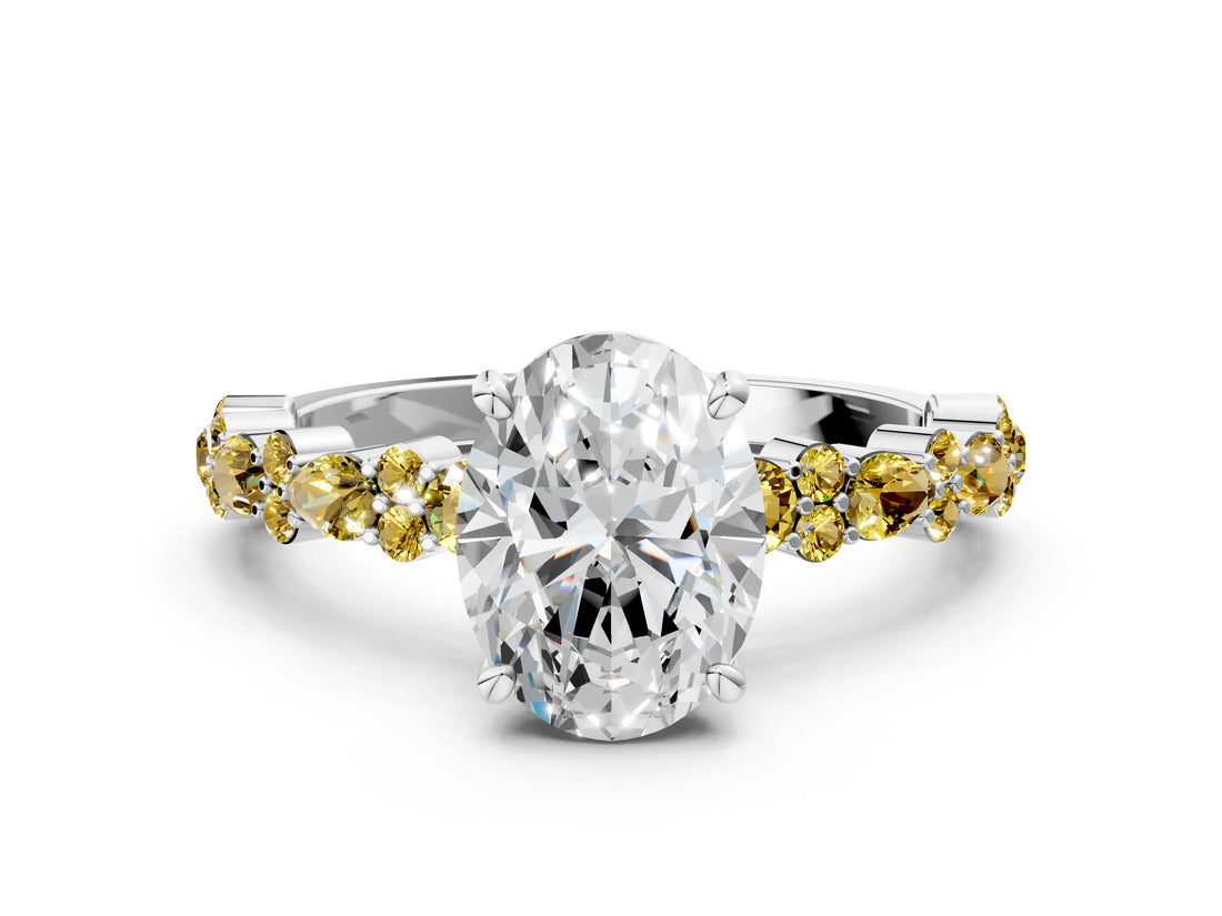 White gold Oval Cut Diamond Side Stone Solitaire Ring with Round with Yellow Sapphire side stone and Four-Prong Setting