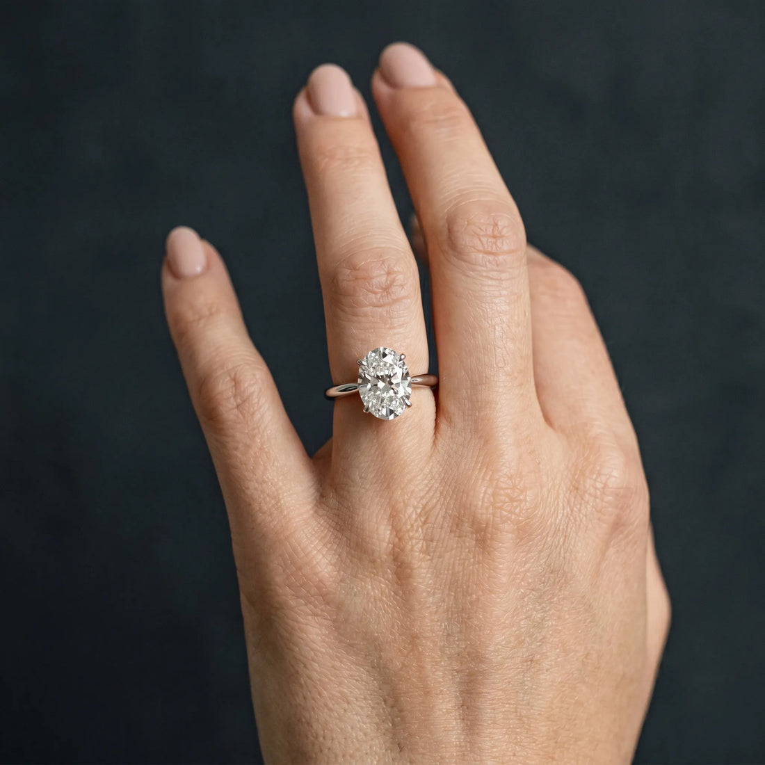 White gold Oval Cut Diamond Solitaire Engagement Ring with Classic Band and Four-Prong Setting_204