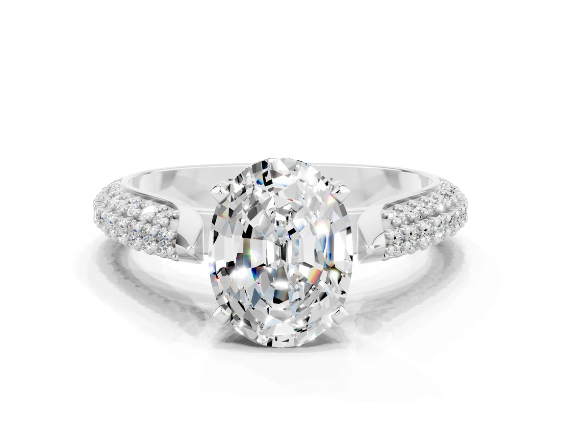 White gold Oval Cut Diamond Solitaire Engagement Ring with Pavé Band and Four-Prong Setting