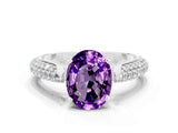 White gold Oval Cut Diamond Solitaire Engagement Ring with Pavé Band and Four-Prong Setting