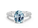 White gold Oval Cut Diamond Solitaire Engagement Ring with Pavé Band and Four-Prong Setting