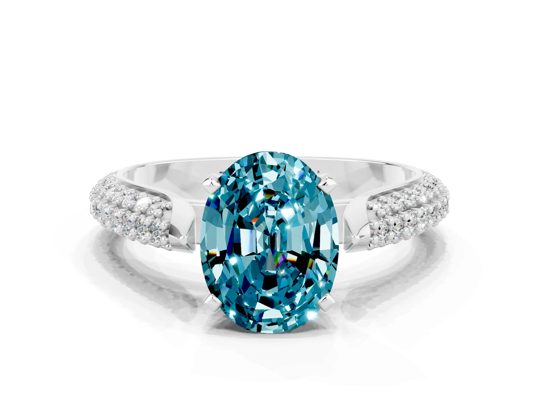 White gold Oval Cut Diamond Solitaire Engagement Ring with Pavé Band and Four-Prong Setting