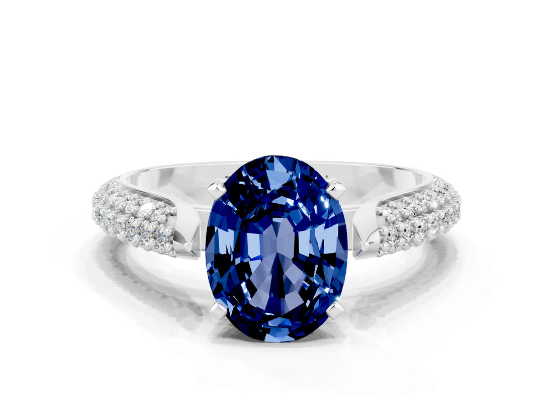 White gold Oval Cut Diamond Solitaire Engagement Ring with Pavé Band and Four-Prong Setting