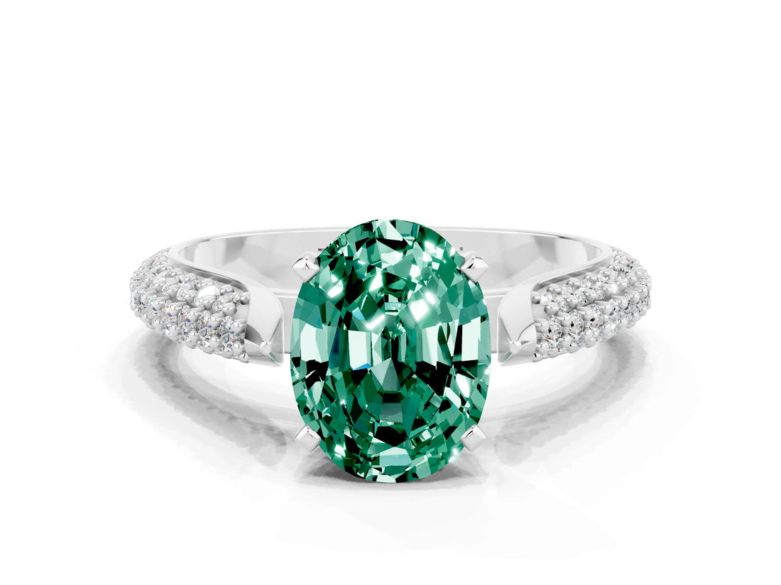 White gold Oval Cut Diamond Solitaire Engagement Ring with Pavé Band and Four-Prong Setting