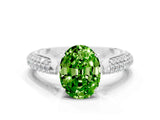 White gold Oval Cut Diamond Solitaire Engagement Ring with Pavé Band and Four-Prong Setting