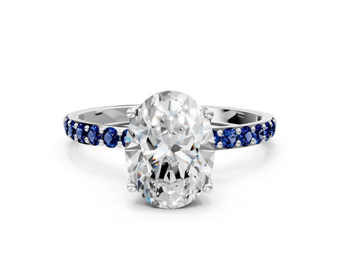 White gold Oval Cut Diamond Solitaire Engagement Ring with Round with Blue Sapphire side stone Pavé Band and Prong Setting_24