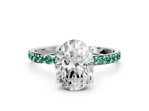 White gold Oval Cut Diamond Solitaire Engagement Ring with Round with Green Sapphire side stone Pavé Band and Prong Setting