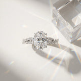 White gold Oval Cut Diamond Solitaire Engagement Ring with Twisted Pavé Band and Four-Prong Setting_96
