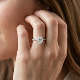 14K White Gold 5.63 Carat E VS1 Oval Diamond Solitaire Pavé Band with Four-Prong Setting