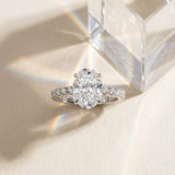 14K White Gold 5.63 Carat E VS1 Oval Diamond Solitaire Pavé Band with Four-Prong Setting