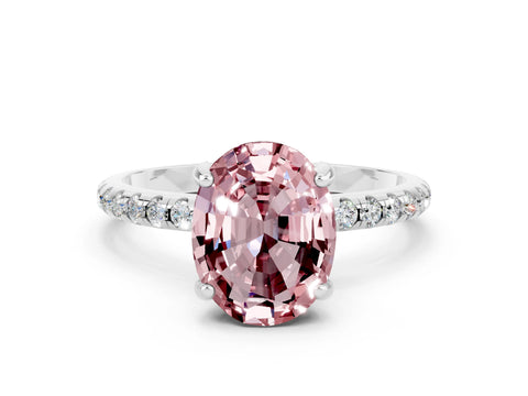 White gold Oval Cut Diamond Solitaire Ring with Four-Prong Setting and Pavé Band
